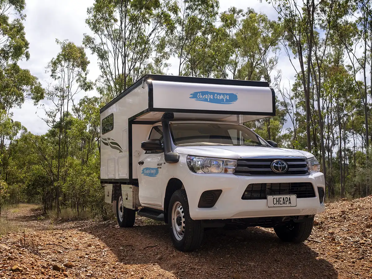 CC 4WD Camper on Dirt Road