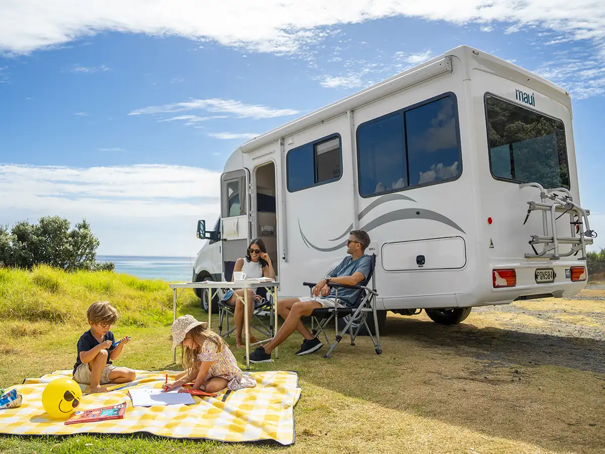 Cascade - 4 Berth Motorhome outdoor view with a Family of 4 in New Zealand
